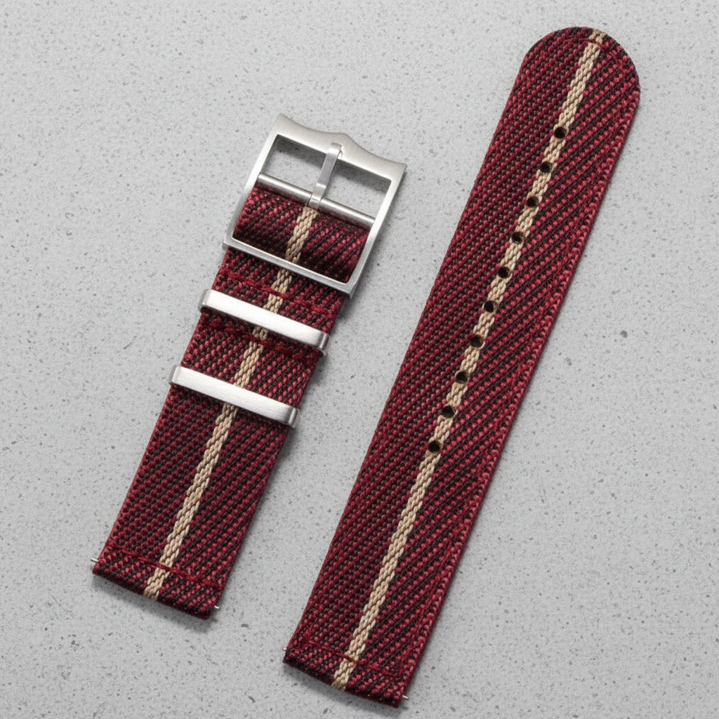 Red and beige striped nylon watch strap with silver pointed buckle 