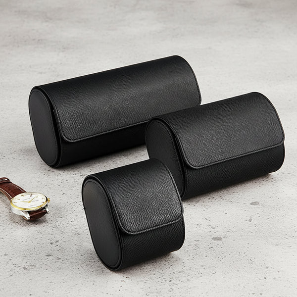 Three black watch storage rolls, sized for 1, 2 , and 3 watches
 