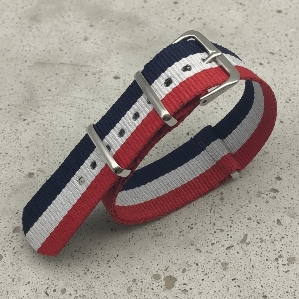 Nylon watch strap with red, white, and blue stripes and a silver buckle
