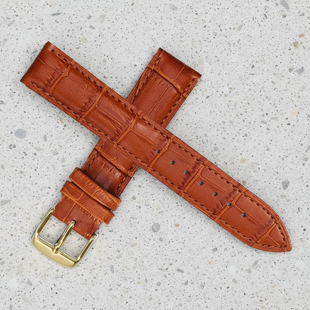 Light brown leather watch strap with gold buckle