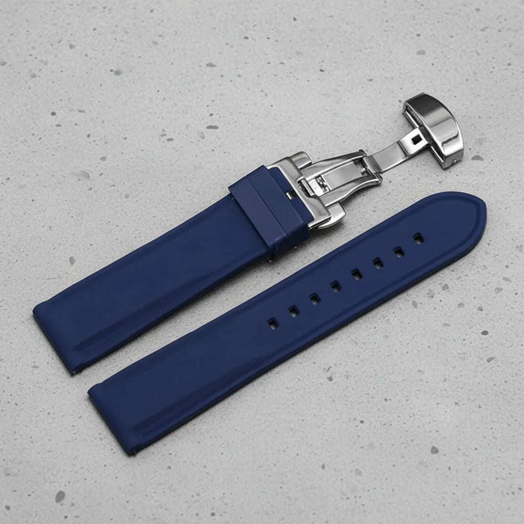 Blue rubber watch strap with silver butterfly clasp