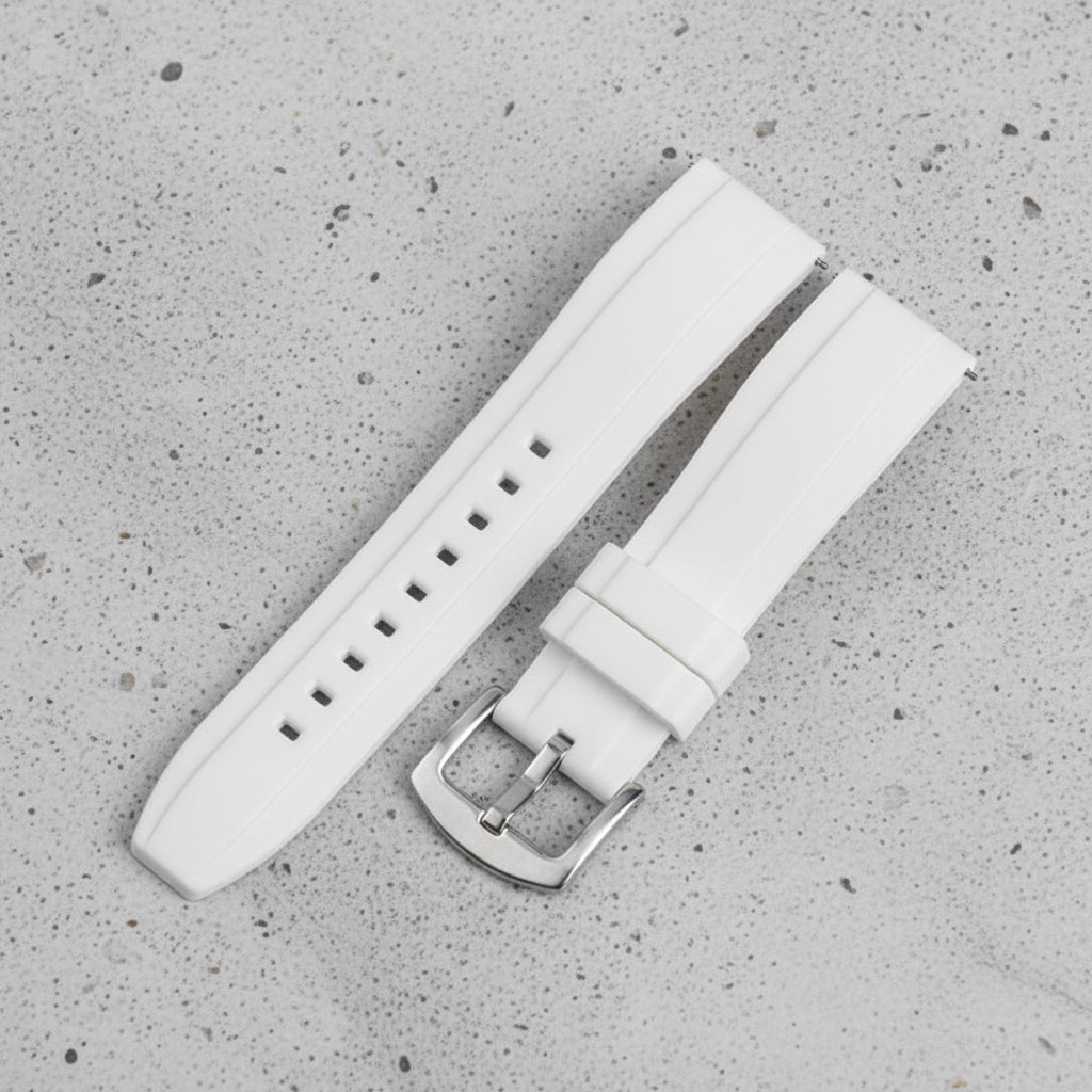 White watch strap with silver buckle
